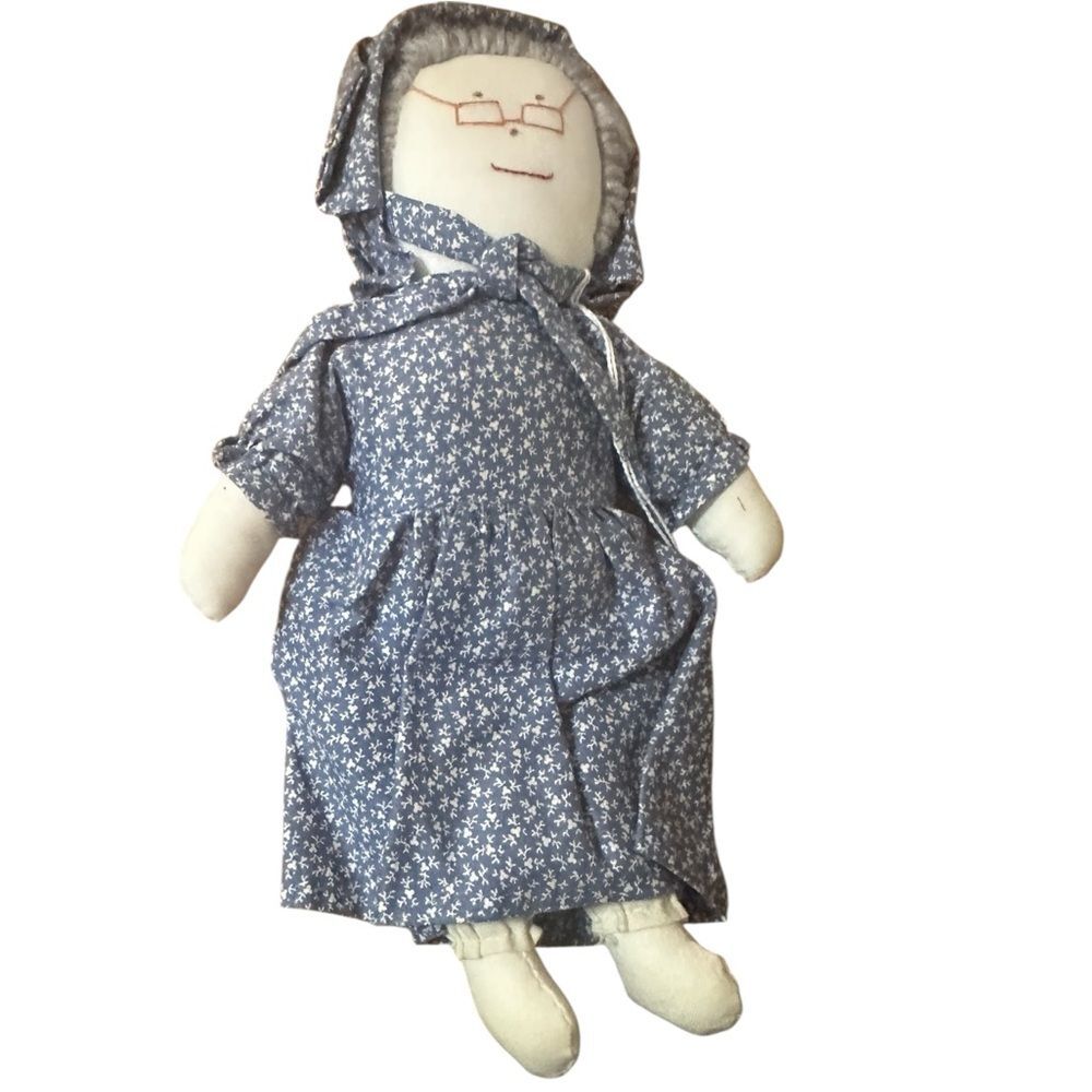 Vintage 1950s handmade cloth granny rag doll. Embroidered face.